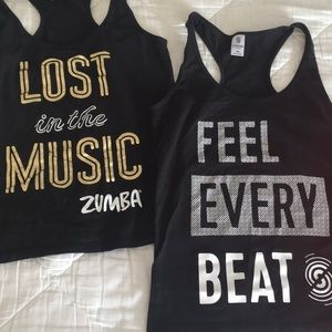 two Zumba shirts size Large.